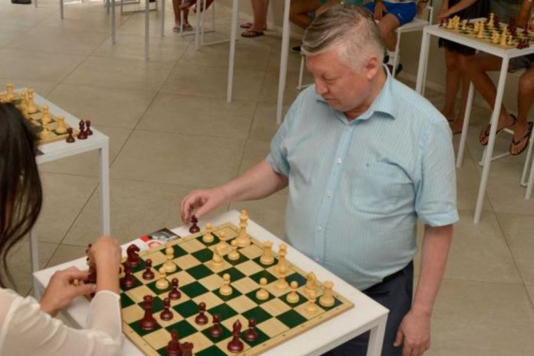 World chess champion Anatoly Karpov third to the left with his